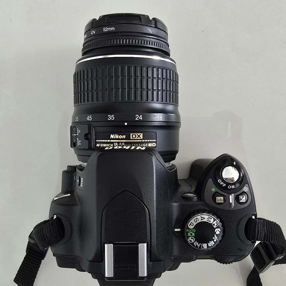 Nikon D40 Black Digital Camera with Two Lenses, Camera Bag And Charging Cord